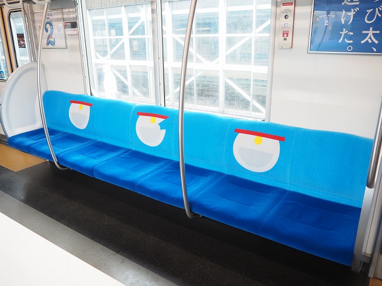 เบาะที่นั่งลายกระเป๋าหน้าท้องสุดคิวทืของโดราเอมอน บน DORAEMON GO!