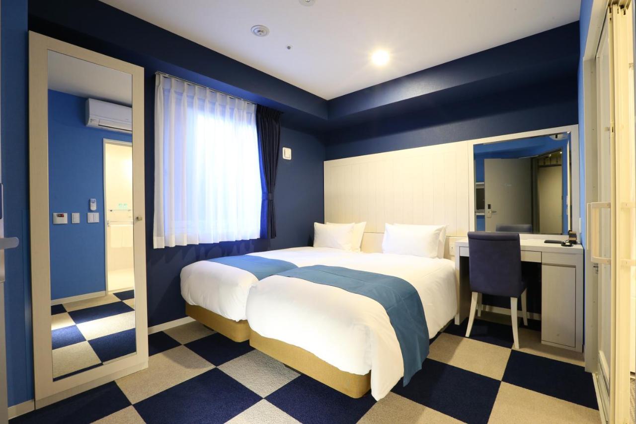 ห้องพัก ห้องสีน้ำเงิน เตียง